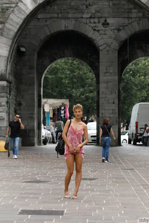 Sylvia Belotti: Tall Italian Brunette Flashes Her Tits Outdoors in a Dress – photo 3 of 12
