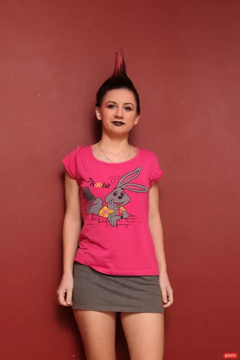 European Woman with Short Hair Poses Fully Clothed – photo 1 of 15