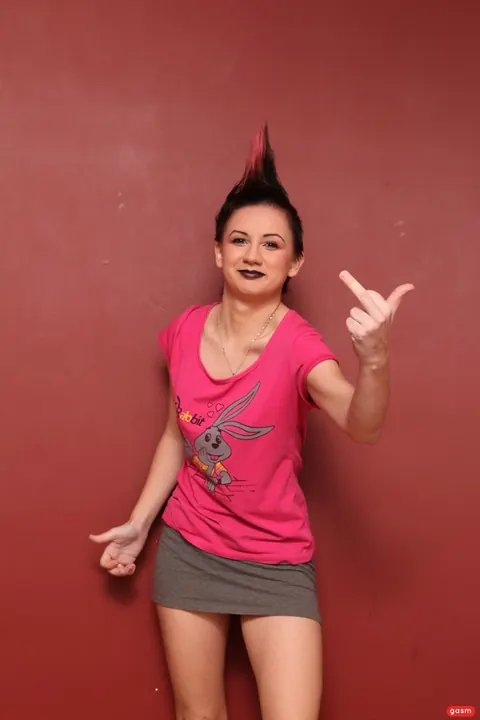 European Woman with Short Hair Poses Fully Clothed – photo 5 of 15