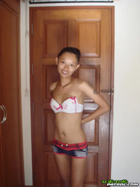 Petite Thai in Shorts Strips and Shows Her Shaved Pussy – photo 13 of 21