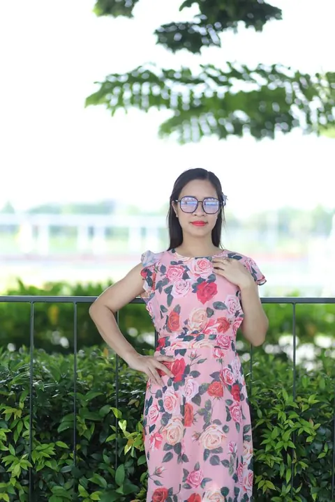 Asian Brunette in a Skirt and Glasses Poses Outdoors – photo 18 of 21