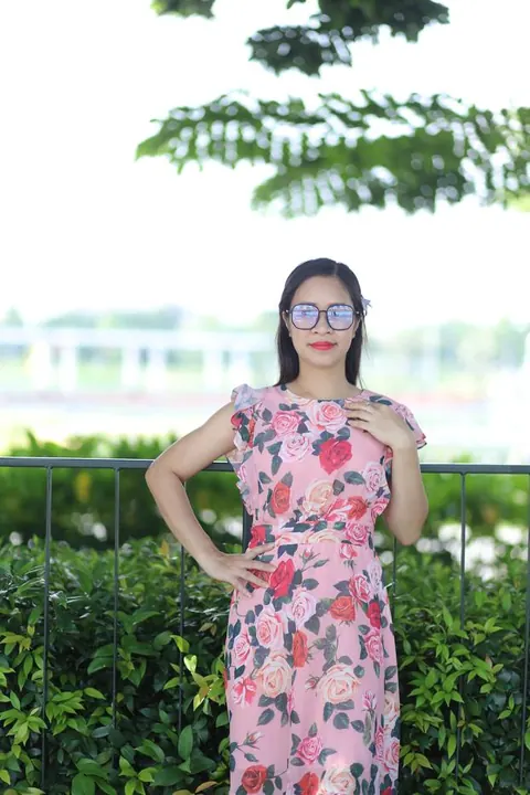 Asian Brunette in a Skirt and Glasses Poses Outdoors – photo 19 of 21