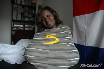 Curvy Ebony Woman with Big Natural Tits Spreads Her Pussy