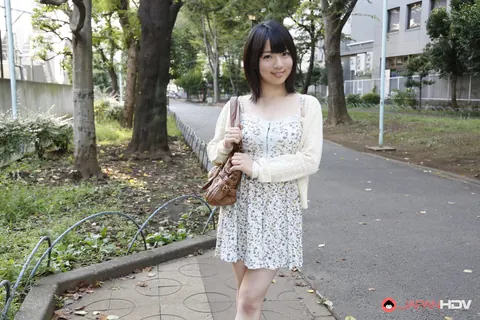 Madoka Adachi: Japanese MILF Shows Her Bare Legs in a Skirt Outdoors – photo 1 of 15