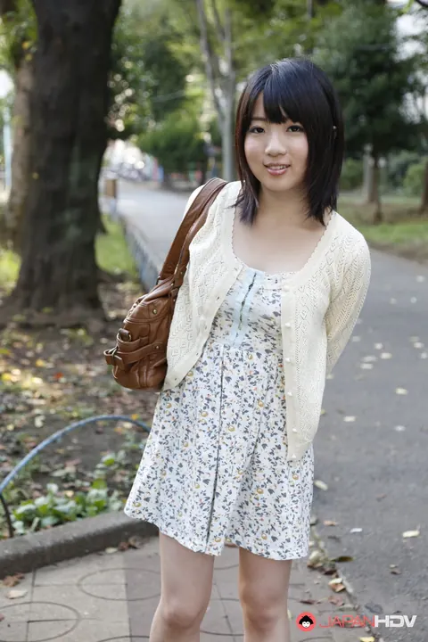 Madoka Adachi: Japanese MILF Shows Her Bare Legs in a Skirt Outdoors – photo 7 of 15