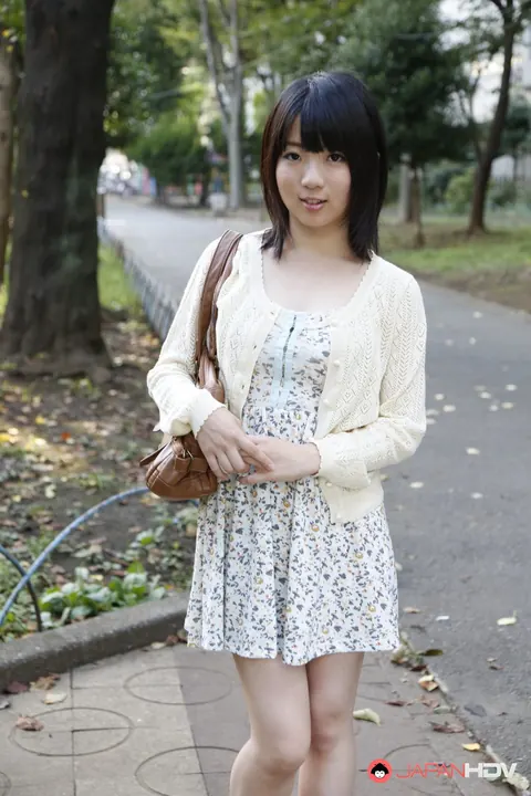 Madoka Adachi: Japanese MILF Shows Her Bare Legs in a Skirt Outdoors – photo 9 of 15