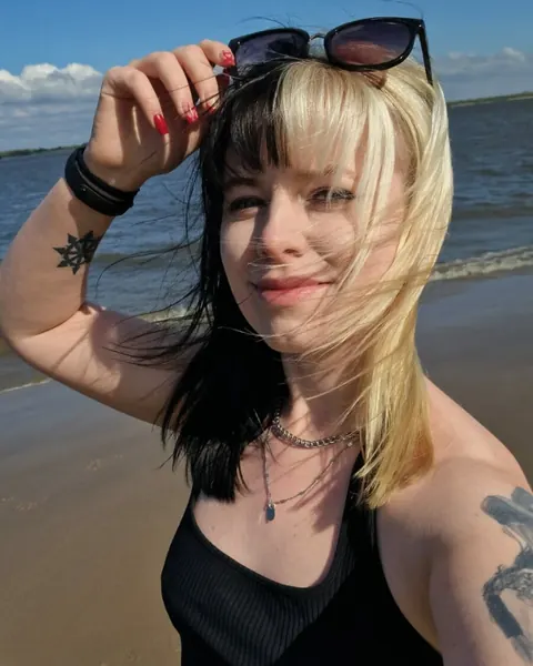 Blonde in a Bikini and Glasses Takes Selfies Outdoors – photo 4 of 13
