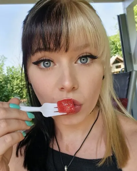 Blonde in a Bikini and Glasses Takes Selfies Outdoors – photo 10 of 13