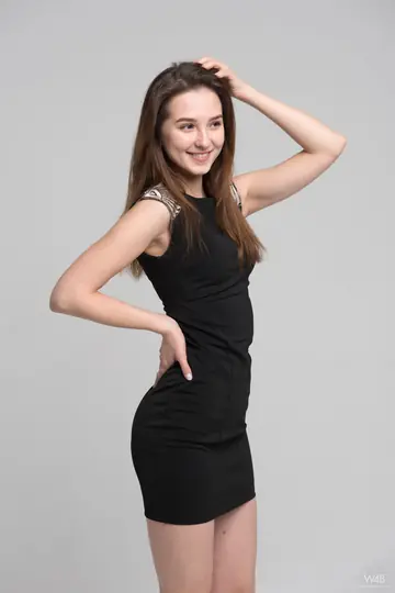 Skinny European Brunette Sheds Her Dress to Reveal Lingerie
