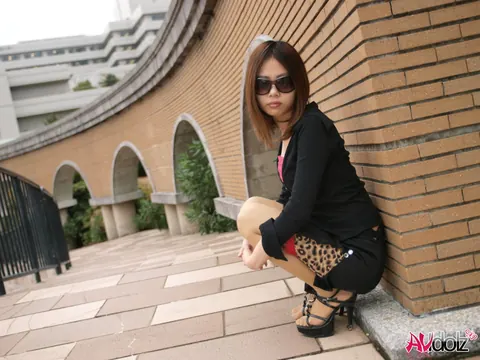 Japanese Brunette Lifts Her Glasses to Show Her Face Outdoors – photo 7 of 15