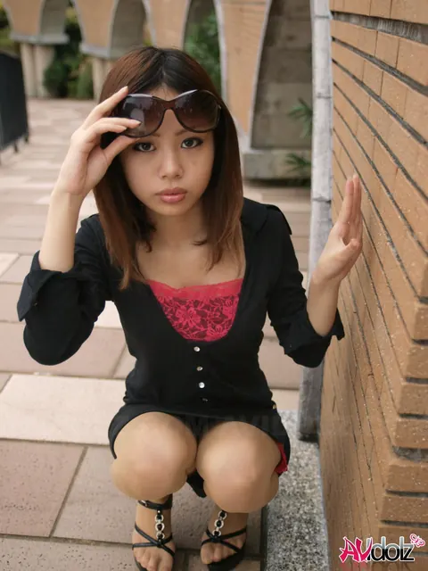 Japanese Brunette Lifts Her Glasses to Show Her Face Outdoors – photo 9 of 15