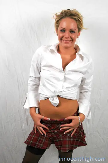 Short-Haired Blonde Lifts Her Mini Skirt and Shows Her Ass