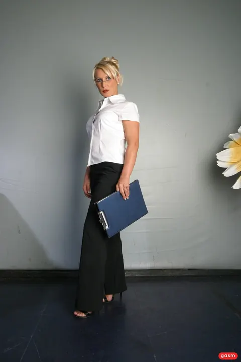Blonde German MILF Poses as Teacher in the Office – photo 2 of 15
