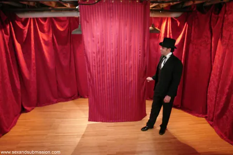 Soolin Kelter: Slim Korean MILF in a Skirt Bound and Caged During a Magic Show – photo 17 of 20