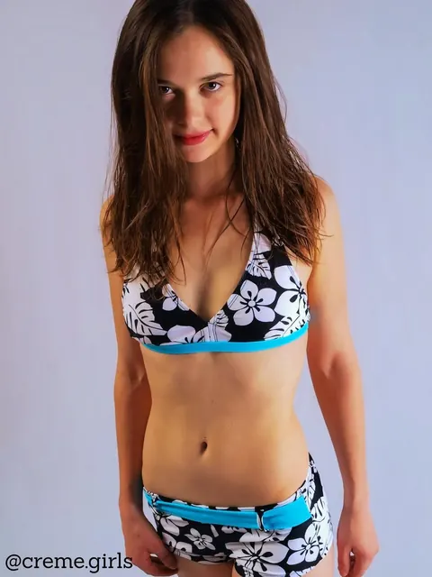 Petite Brunette Strips Nude and Displays Slim Frame – photo 6 of 21