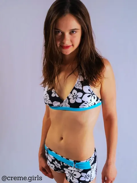 Petite Brunette Strips Nude and Displays Slim Frame – photo 5 of 21