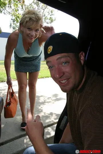 Thick Brunette MILF in a Skirt Gives a Blowjob and Handjob in the Car