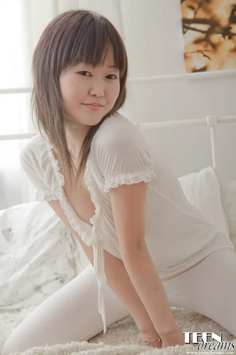 Aliona Sevil: Asian Brunette in Socks Strips Nude and Shows Her Curvy Ass – photo 5 of 21