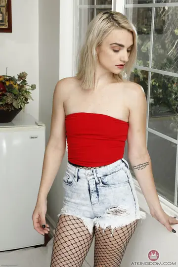 Slim Blonde Strips Out of Her Shorts and Fishnet Pantyhose