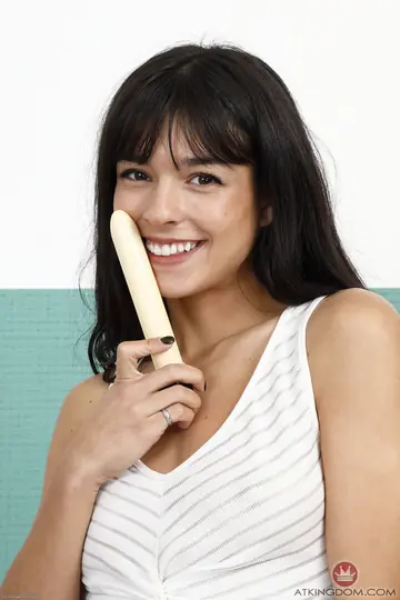Petite Short-Haired Brunette Spreads and Uses a Dildo