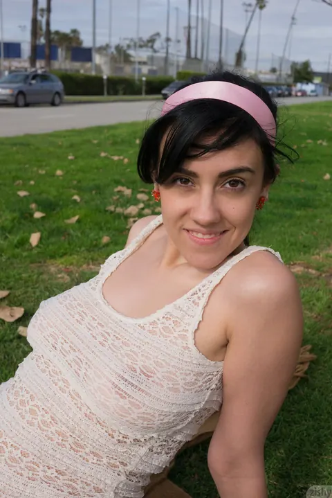 Aysha Thoen: Petite Brunette in Shorts Flashes Her Big Tits in Public Park – photo 6 of 12