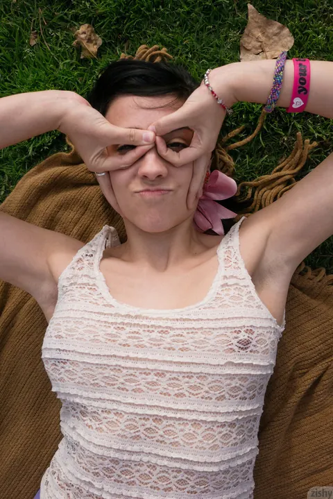 Aysha Thoen: Petite Brunette in Shorts Flashes Her Big Tits in Public Park – photo 7 of 12