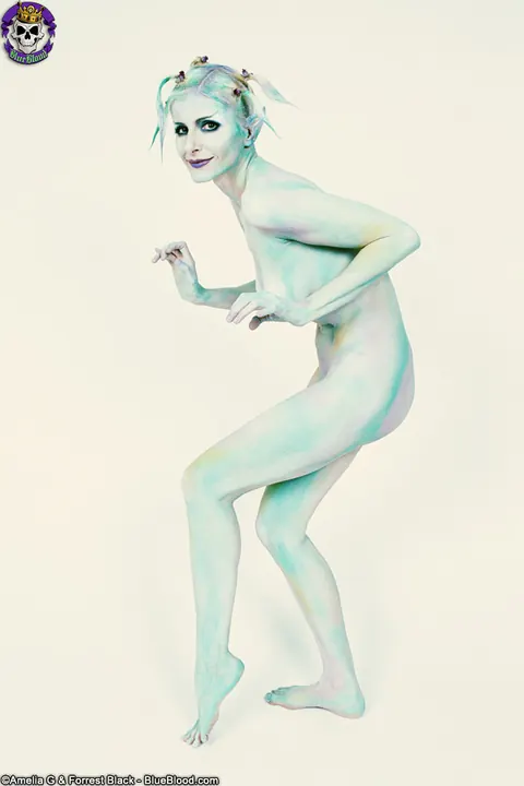 Pale Blonde Strips Out of Her Cosplay Costume for Modelling Gig – photo 13 of 15