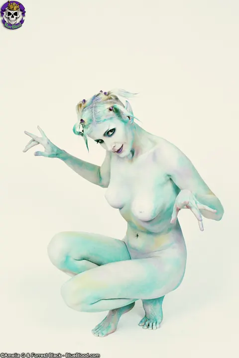 Pale Blonde Strips Out of Her Cosplay Costume for Modelling Gig – photo 12 of 15