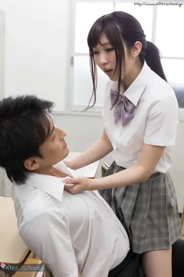 Japanese Brunette Gives a Footjob in a Skirt