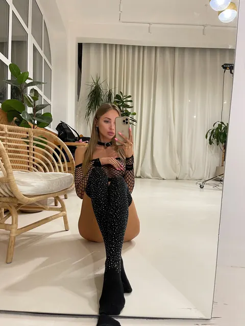 European Blonde Teases in Fishnet Lingerie on the Sofa – photo 8 of 13