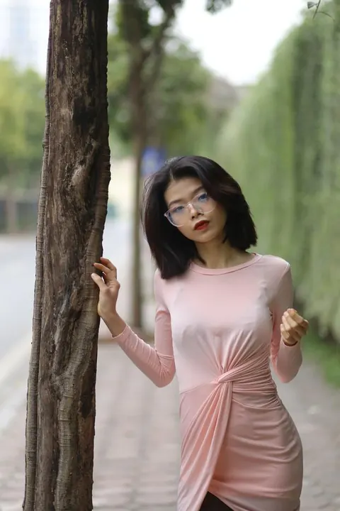 Thick Asian Babe in Yoga Pants and Glasses Poses Outdoors – photo 1 of 21