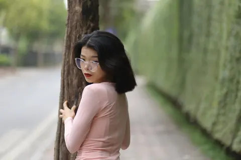 Thick Asian Babe in Yoga Pants and Glasses Poses Outdoors – photo 7 of 21
