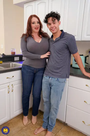Curvy Redhead MILF Holds Big Tits After Kitchen Anal