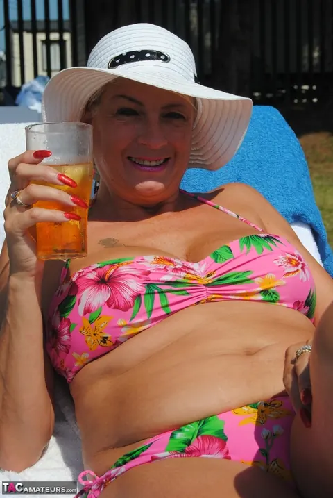 Blonde MILF Swims in a Bikini and Glasses Then Flashes Her Tits – photo 10 of 20