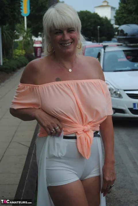 Blonde MILF Swims in a Bikini and Glasses Then Flashes Her Tits – photo 19 of 20