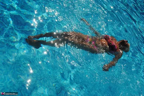 Blonde MILF Swims in a Bikini and Glasses Then Flashes Her Tits – photo 2 of 20