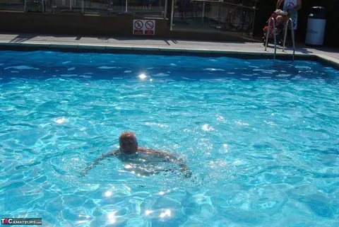 Blonde MILF Swims in a Bikini and Glasses Then Flashes Her Tits – photo 3 of 20
