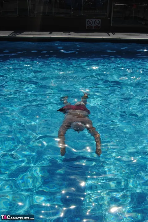 Blonde MILF Swims in a Bikini and Glasses Then Flashes Her Tits – photo 11 of 20