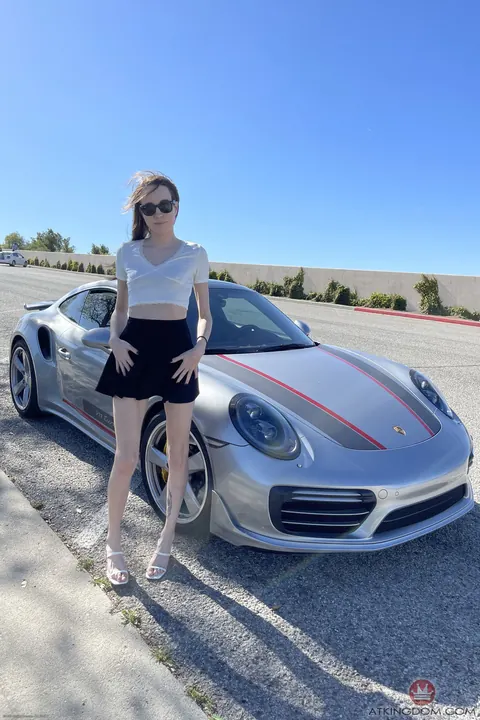 Brooke Johnson: Busty Brunette in Glasses Spreads Outdoors by a Car – photo 21 of 21