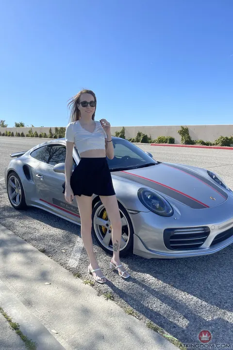 Brooke Johnson: Busty Brunette in Glasses Spreads Outdoors by a Car – photo 20 of 21