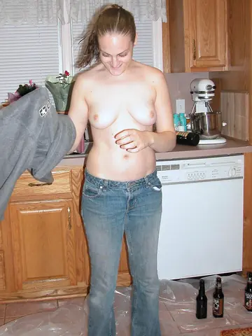 Amateur in Jeans Strips and Spreads Her Pussy