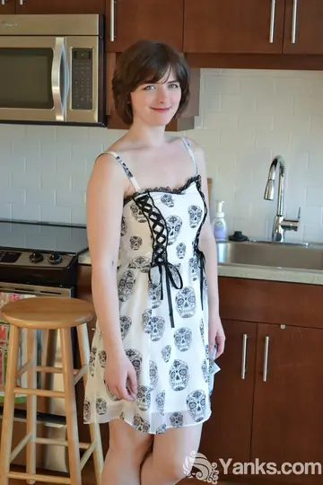 Pale Brunette with Short Hair Fingers Her Shaved Pussy