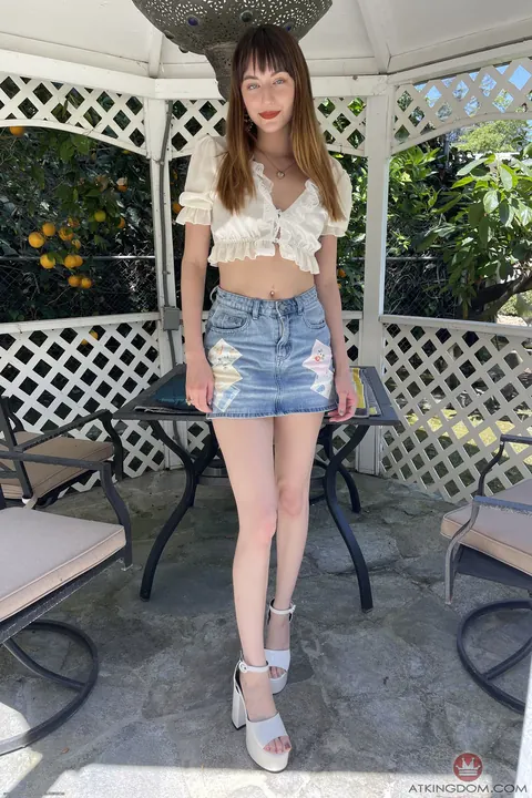 Lana Smalls: Petite Brunette Teases in a Short Skirt Outdoors – photo 1 of 21