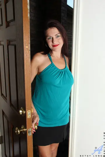 Brunette MILF Undresses to Show Her Hairy Pussy and Tattoo