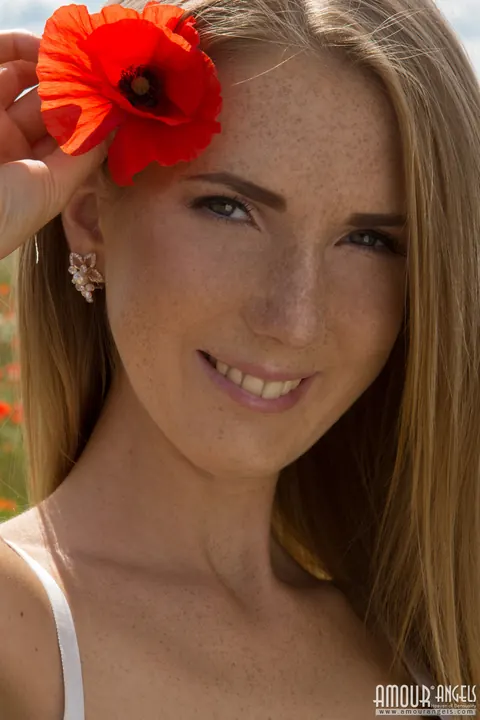 Blonde Sheds Her Lingerie on a Mat in a Wildflower Field – photo 2 of 20