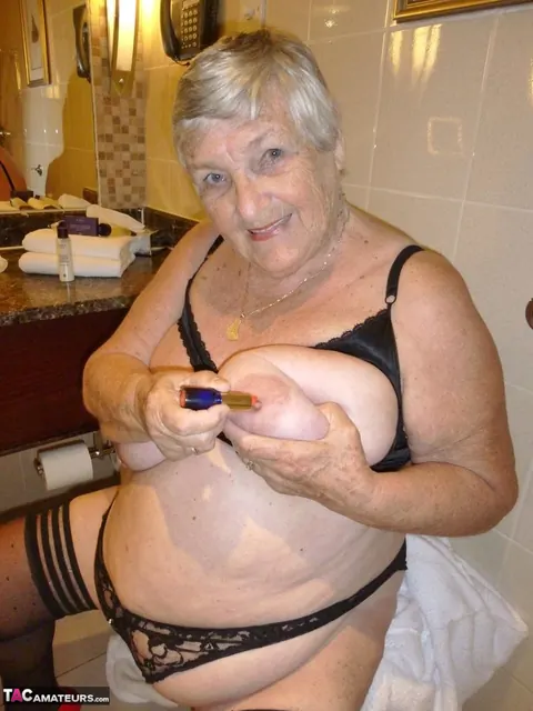 British BBW Strips Out of Her Bathrobe and Bra in High Heels – photo 8 of 20