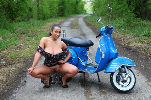 Danica Collins: Curvy Ebony MILF Spreads Her Legs on a Motorcycle in the Woods – photo 11 of 20