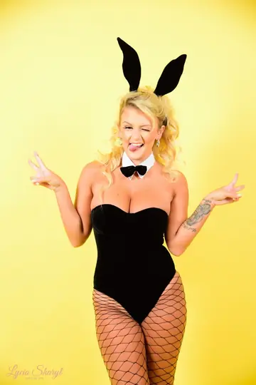 British Blonde with Big Tits Strips Out of Her Bunny Outfit
