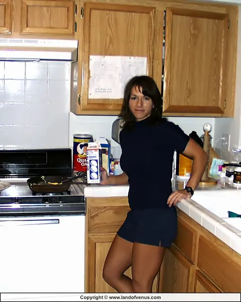 Venus: Muscular Brunette MILF Flexes Big Tits and Ass in the Bathroom and Kitchen – photo 1 of 13