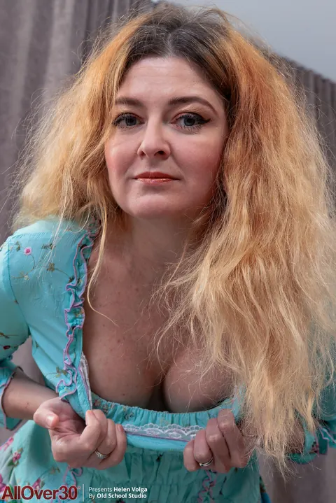 Helen Volga: Russian Redhead MILF Pulls Pantyhose Aside to Dildo Her Hairy Pussy – photo 3 of 21